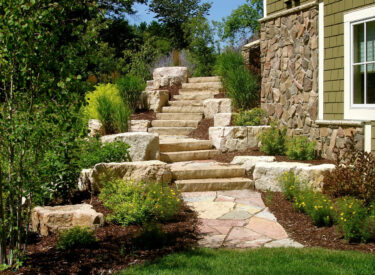 Boulders with stairs and landscpaing
