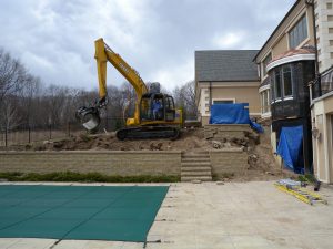 before retaining wall pool home