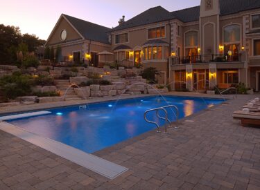 Boulder wall and natural stone in the pool area