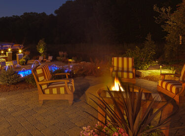 Boulder retaining walls with firepit 6