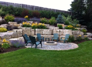 Boulder retaining walls with firepit 4