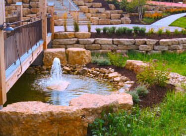 Boulder Retaining wall with water fountain
