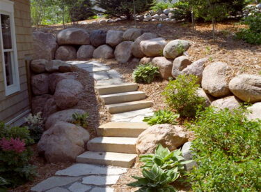 Natural stone steps and boulder design