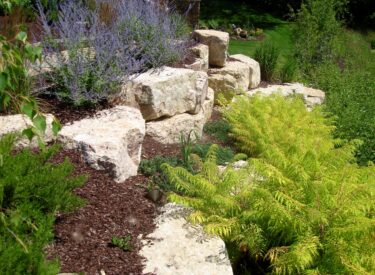 Boulder retaining walls and landscaping