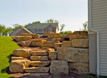 natural stone steps and boulder walls