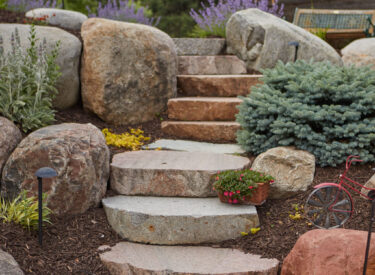 Natural stone steps, boulder retaining wall and plants 5